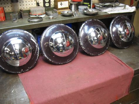 1936 ford sheet metal parts|1936 Ford hubcaps.